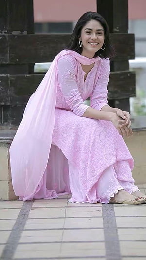 Mrunal Thakur in a Soft Pink Embroidered Anarkali Suit with Flowing Dupatta HD phone wallpaper
