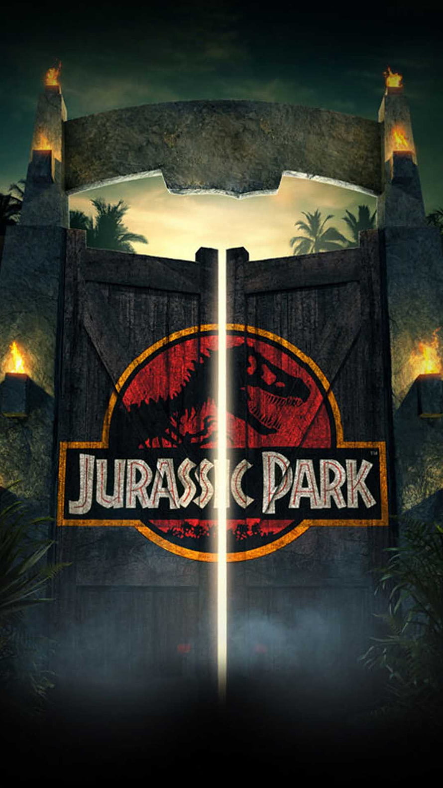Jurassic Park Iconic Logo on Grand Stone Gate with Torches and Misty Jungle Atmosphere HD phone wallpaper