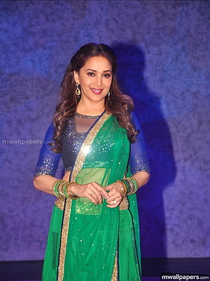Madhuri Dixit in a Green Saree with Blue Blouse and Gold Jewelry HD phone wallpaper