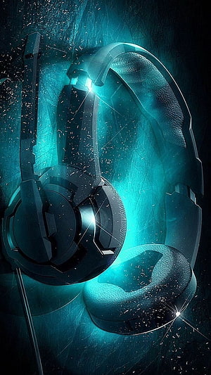 Futuristic Gaming Headphones with Cyan Neon Glow and Sparkling Particle Effects HD phone wallpaper