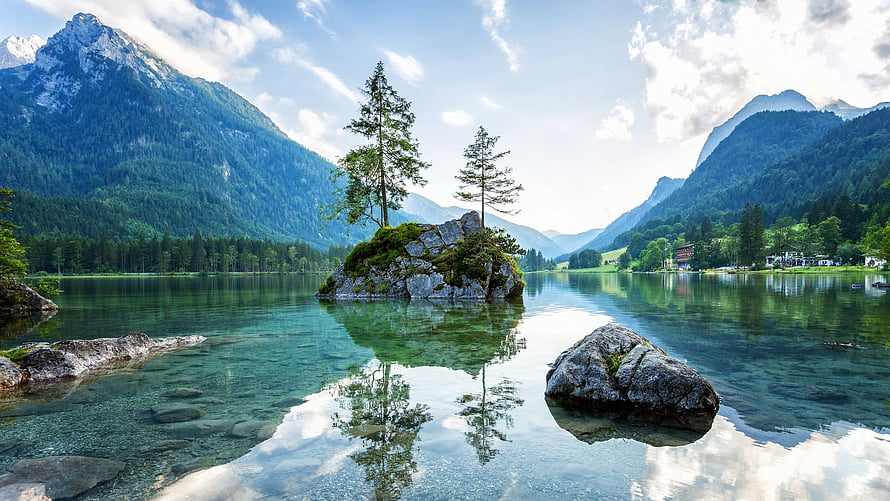 Lake Hintersee in the Bavarian Alps with a small rocky island and pine trees HD wallpaper