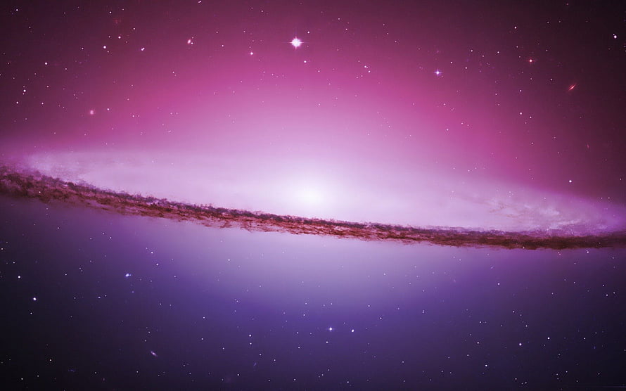 Sombrero Galaxy in Vivid Purple and Pink Hues with Scattered Stars HD wallpaper