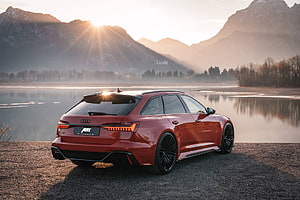 ABT Audi RS6 Avant in Red Parked by a Mountain Lake at Sunrise HD wallpaper