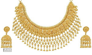 Traditional Indian Gold Necklace and Jhumka Earring Set with Intricate Filigree Work HD wallpaper