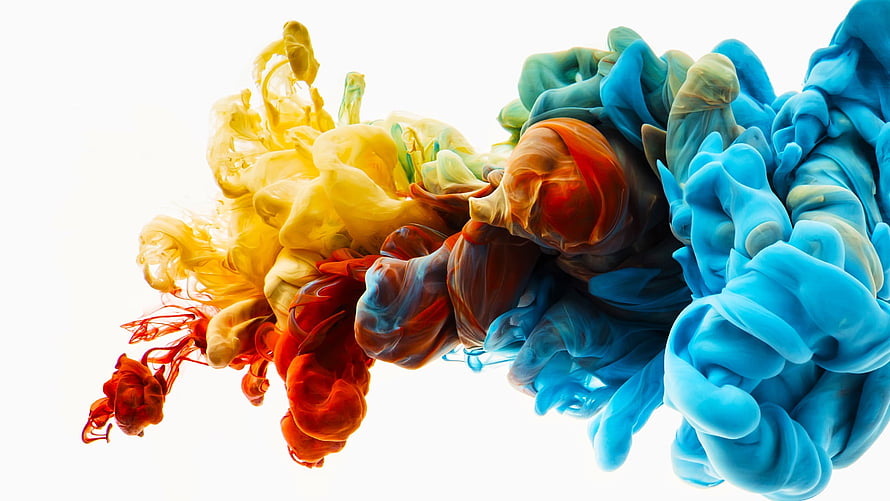 Vibrant Colorful Ink Clouds in Water on White Background HD wallpaper