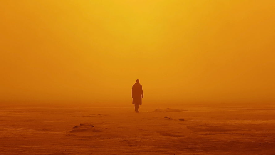 Officer K Walking Through Orange Haze in Blade Runner 2049 Cinematic Scene HD wallpaper