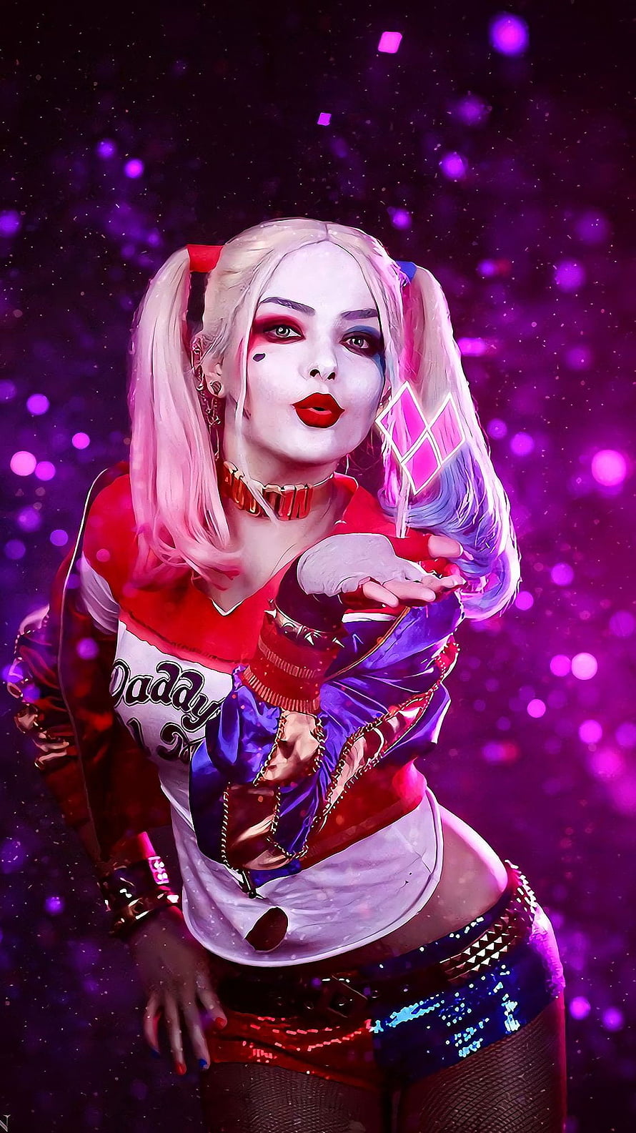 Harley Quinn in a vibrant red and purple costume with blonde pigtails against a glowing bokeh background HD phone wallpaper