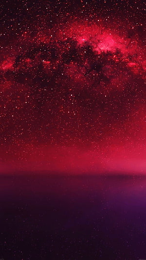 Crimson Nebula Over Dark Horizon with Scattered Stars and Deep Purple Atmosphere HD phone wallpaper