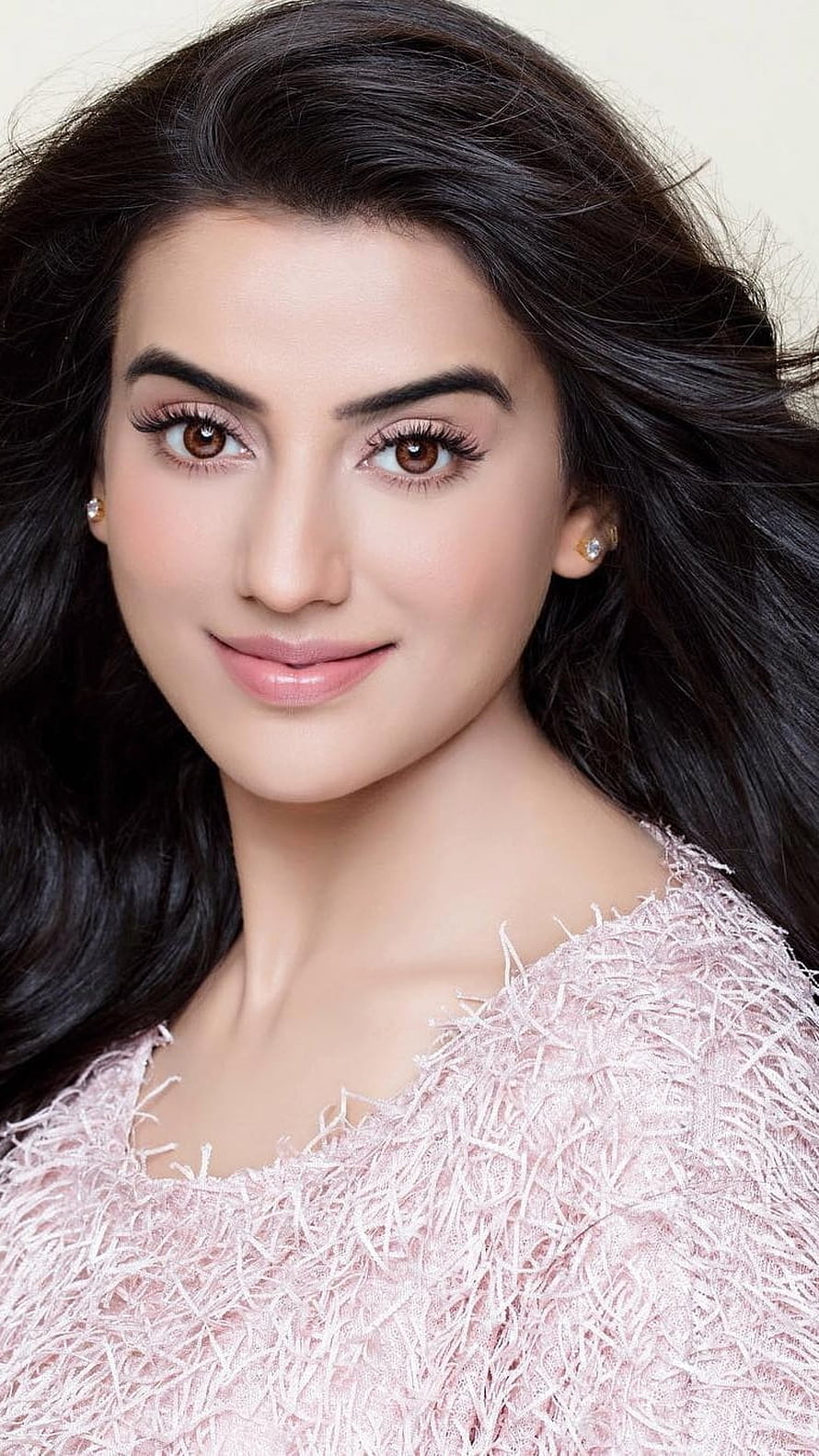 Akshara Singh Portrait in Soft Pink Textured Top with Flowing Dark Hair HD phone wallpaper