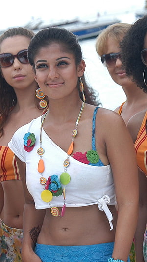 Nayantara in White Crochet Top and Colorful Beaded Necklace at Beach Event HD phone wallpaper