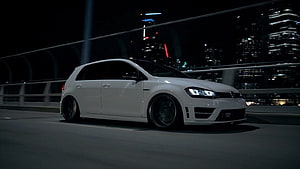 White Volkswagen Golf R MK7 Stance Build on a Night City Bridge HD wallpaper
