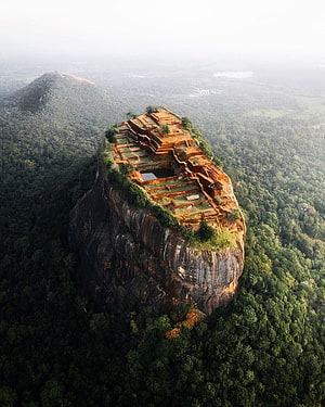 Aerial View of Sigiriya Rock Fortress and Ancient Terraced Gardens in Sri Lanka HD phone wallpaper