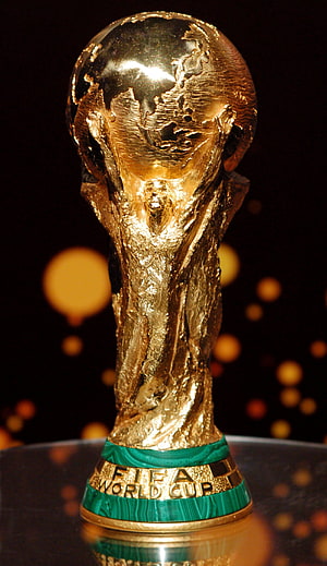 FIFA World Cup Trophy Golden Sculpture with Malachite Bands and Globe Design HD phone wallpaper