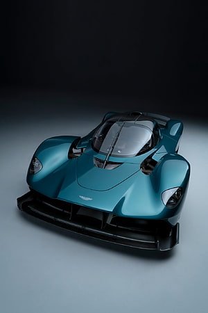 Aston Martin Valkyrie Hypercar in Teal with Aggressive Front Splitter and Canopy Design HD phone wallpaper