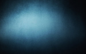 Dark Blue Gradient Background with Soft Central Glow and Subtle Texture HD wallpaper