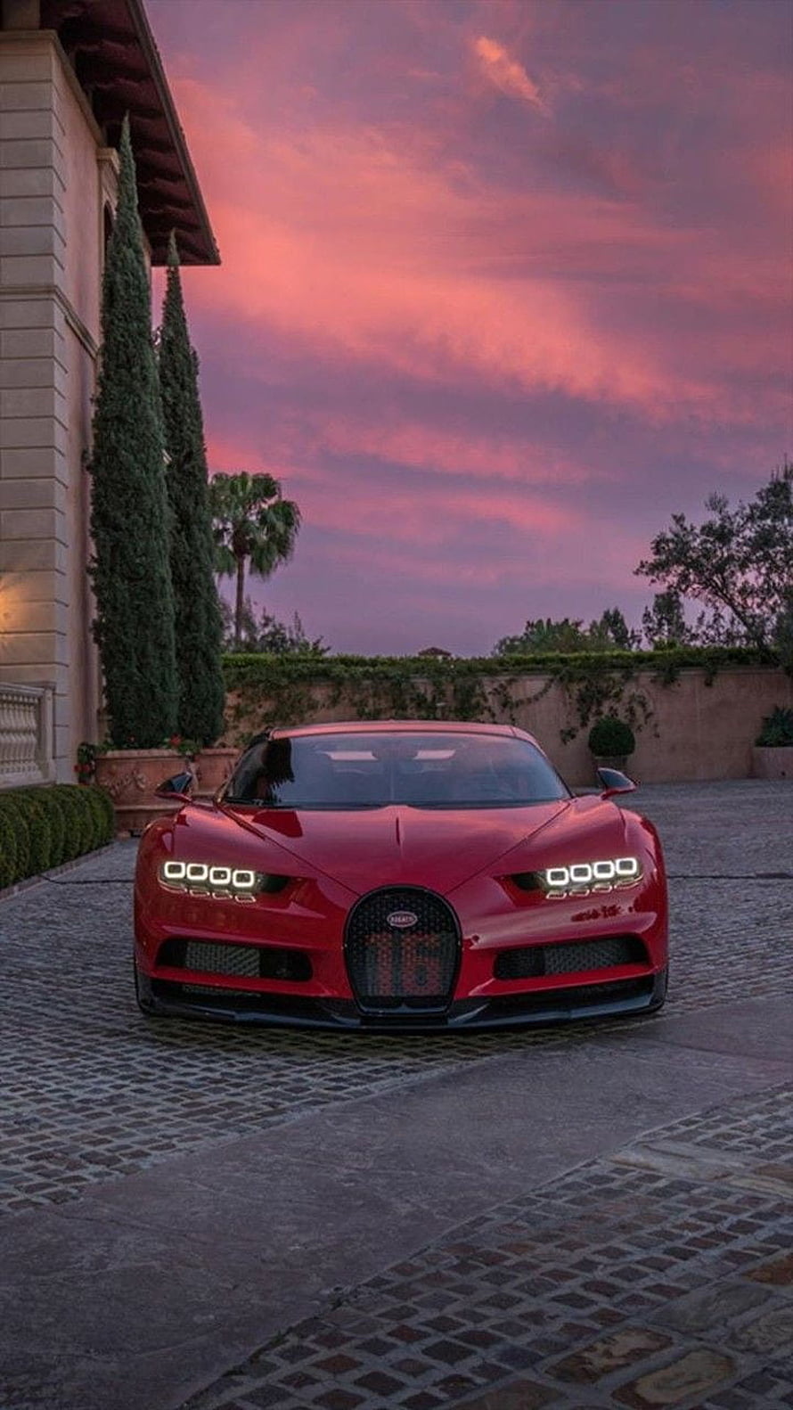 Red Bugatti Chiron Parked on Cobblestone Driveway at Sunset HD phone wallpaper