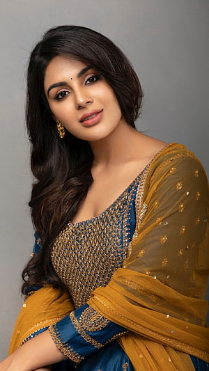 Samyuktha Menon in an elegant blue and gold embroidered saree with a mustard dupatta HD phone wallpaper