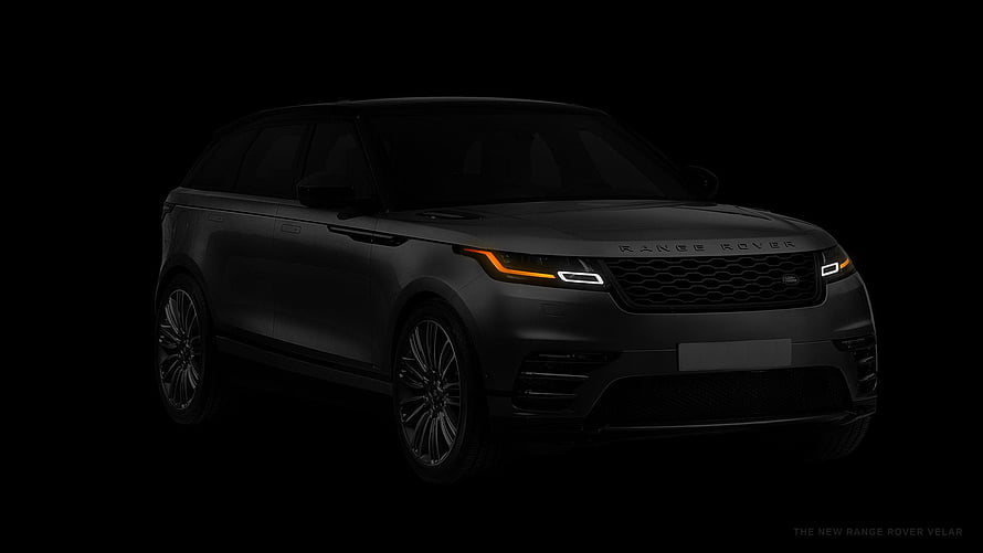 Range Rover Velar SUV in Dark Matte Finish with Dramatic Studio Lighting HD wallpaper