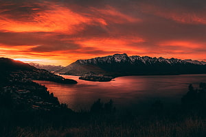 Fiery Sunset Over Snow-Capped Mountains and Lake in New Zealand HD wallpaper