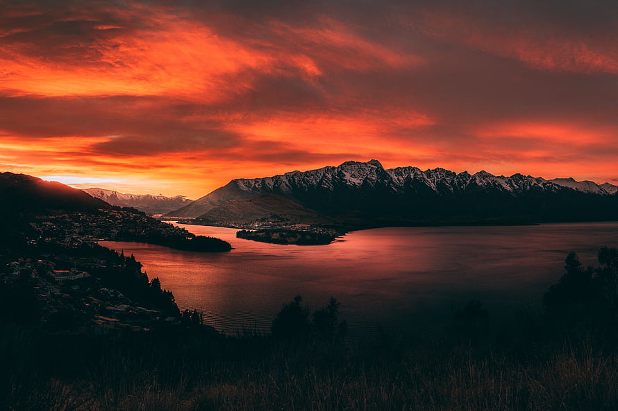 Fiery Sunset Over Snow-Capped Mountains and Lake in New Zealand HD wallpaper