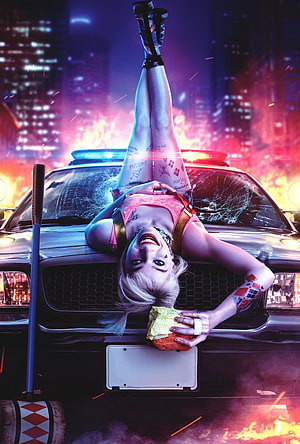 Harley Quinn leaning on a police car with a baseball bat in a fiery city street HD phone wallpaper