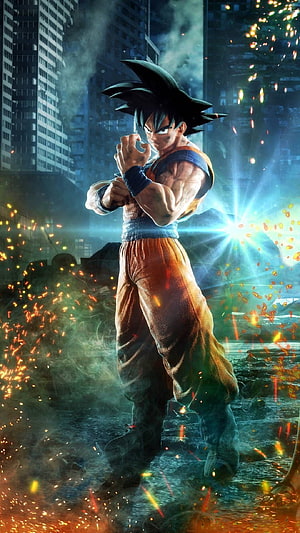 Son Goku in battle stance amid city destruction and flying embers HD phone wallpaper