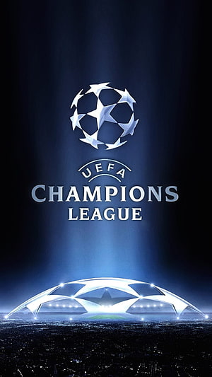 UEFA Champions League Starball Logo Over Illuminated Stadium at Night HD phone wallpaper