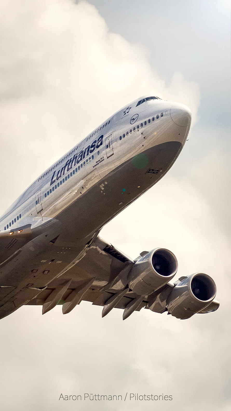 Lufthansa Boeing 747-8 Jumbo Jet Ascending Through Cloudy Skies HD phone wallpaper