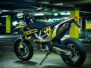 Husqvarna 701 Supermoto Motorcycle in Underground Parking Garage HD wallpaper
