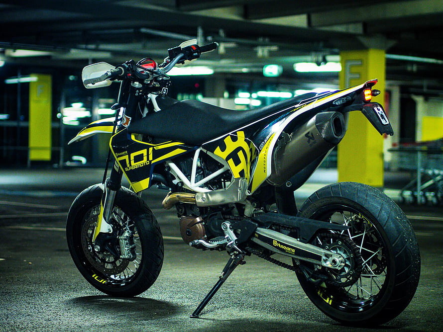 Husqvarna 701 Supermoto Motorcycle in Underground Parking Garage HD wallpaper