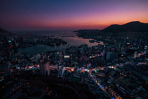 Aerial View of Busan Cityscape at Dusk with Starry Sky and Harbor Lights HD wallpaper