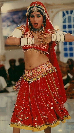 Madhuri Dixit in Vibrant Red Bollywood Dance Costume with Traditional Jewelry HD phone wallpaper