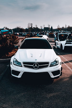White Mercedes-Benz C63 AMG Black Series Front View at Outdoor Car Meet HD phone wallpaper