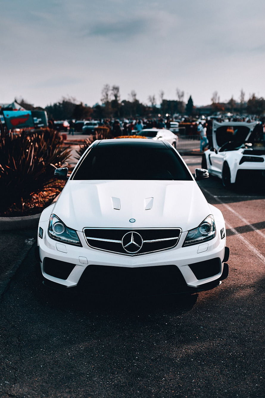 White Mercedes-Benz C63 AMG Black Series Front View at Outdoor Car Meet HD phone wallpaper