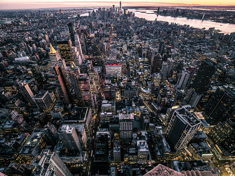 Aerial View of New York City Skyline at Dusk with Manhattan and the East River HD wallpaper