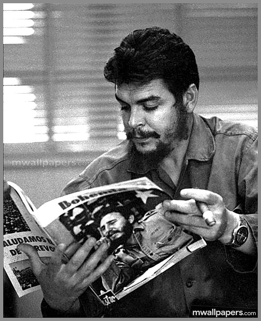 Che Guevara Reading a Magazine Featuring Fidel Castro in a Black and White Portrait HD phone wallpaper