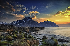 Dramatic Norwegian Fjord Landscape with Snow-Capped Mountains at Golden Sunset HD wallpaper