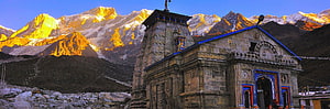 Kedarnath Temple at Sunrise with Snow-Capped Himalayan Peaks in the Background HD wallpaper