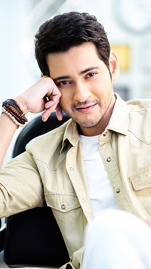 Mahesh Babu in a beige shirt with a relaxed pose and subtle smile HD phone wallpaper