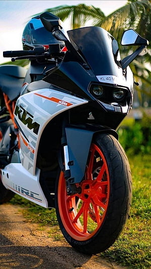 KTM RC 200 Black Sport Motorcycle with Orange Rims and Geometric Livery HD phone wallpaper