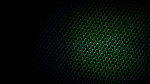 Dark Green Hexagonal Mesh Pattern with Deep Gradient Glow HD wallpaper