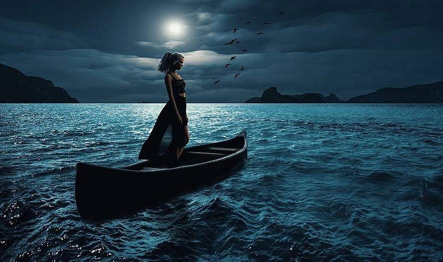 Silhouette of a woman standing in a canoe on a dark lake under a full moon with birds flying overhead HD wallpaper