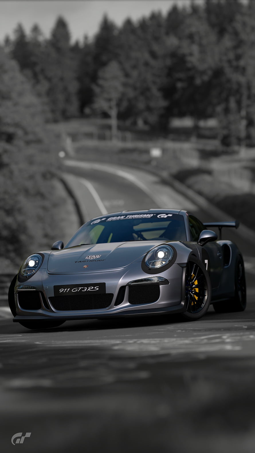 Porsche 911 GT3 RS on a winding forest road in a desaturated cinematic style HD phone wallpaper