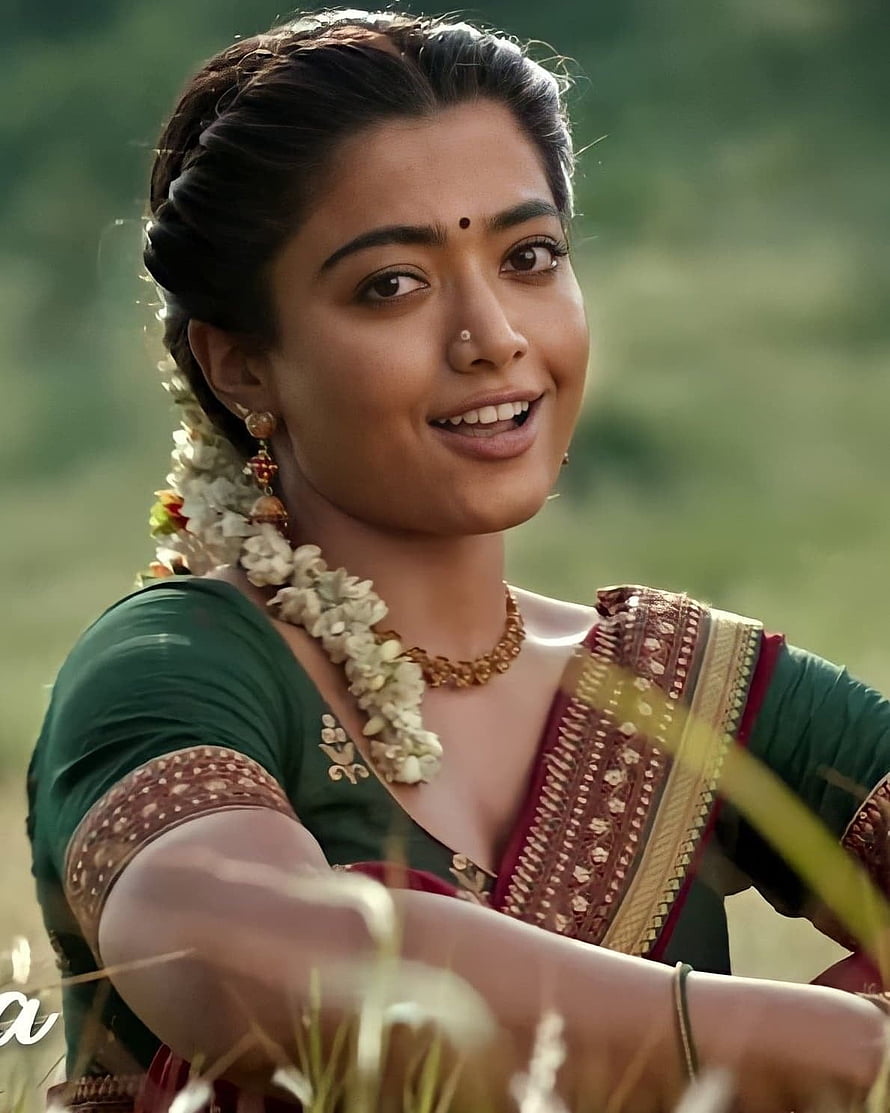 Rashmika Mandanna in traditional green saree with jasmine garland and gold jewelry HD phone wallpaper