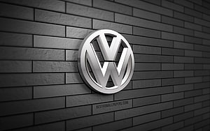 Volkswagen 3D Metal Emblem Mounted on Dark Gray Brick Wall HD wallpaper
