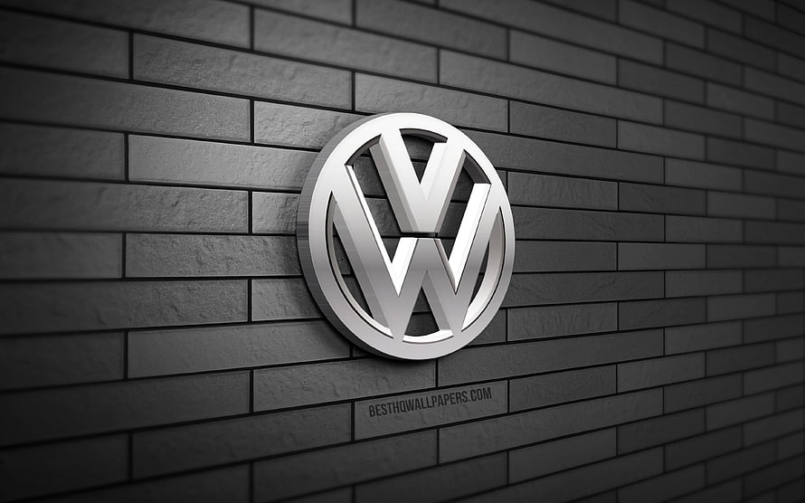 Volkswagen 3D Metal Emblem Mounted on Dark Gray Brick Wall HD wallpaper