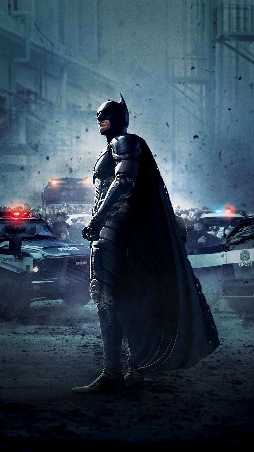 Batman in Dark Knight Rises Standing Before GCPD Police Vehicles in Smoky Urban Setting, The Dark Knight Rises (2012) . Moviemania. The dark knight rises, Batman the dark knight, Dark knight, Christian Bale Batman HD phone wallpaper