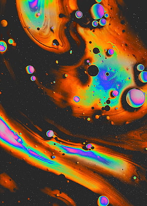 Vibrant psychedelic fluid art with iridescent bubbles and swirling orange cosmic patterns HD phone wallpaper