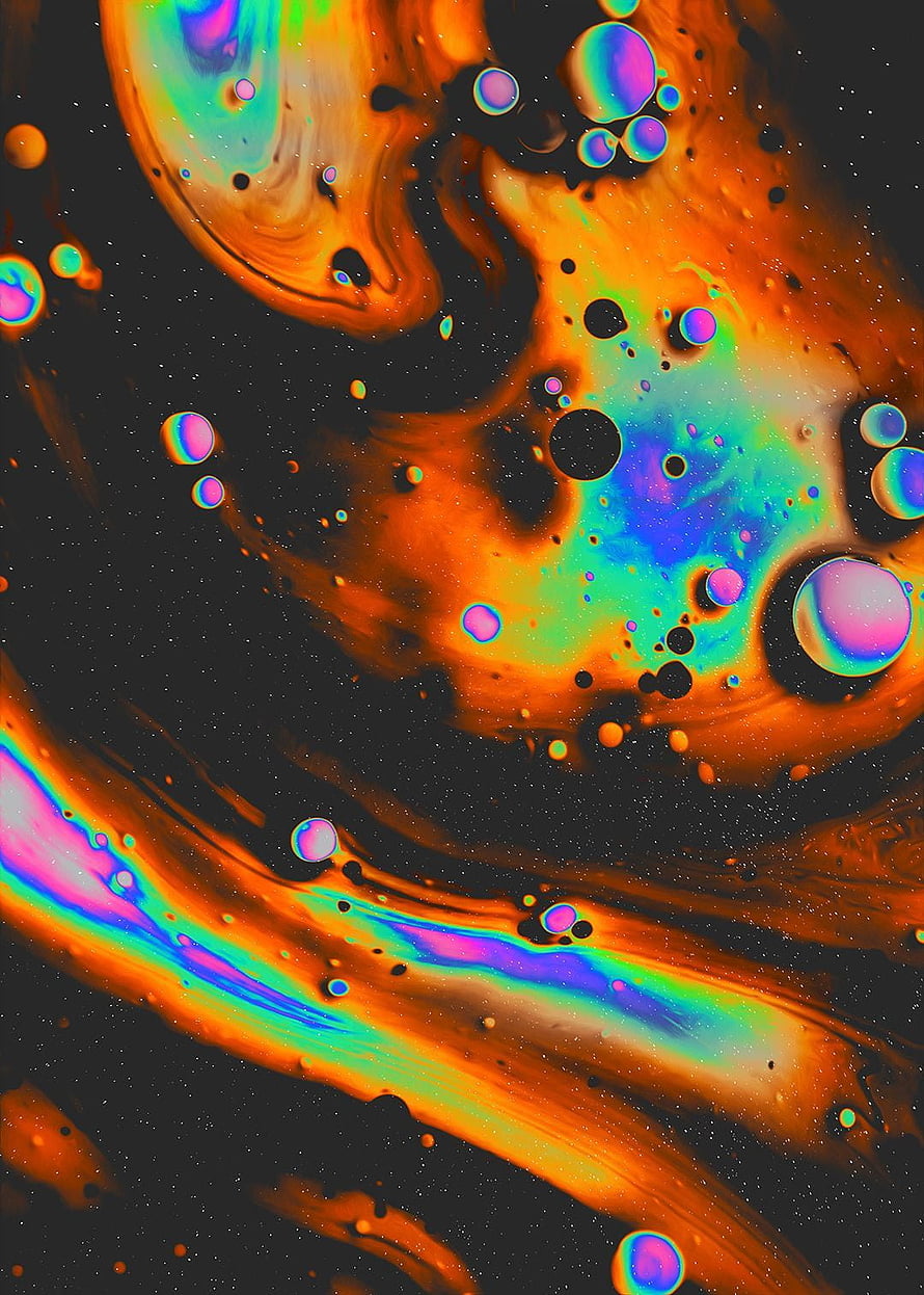 Vibrant psychedelic fluid art with iridescent bubbles and swirling orange cosmic patterns HD phone wallpaper