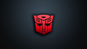 Red Transformers Autobot Emblem on Dark Gradient Background HD wallpaper